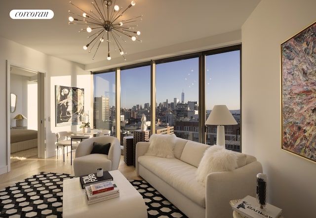 living area featuring visible vents, a view of city, and an inviting chandelier