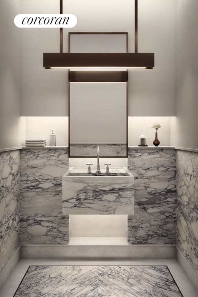 bathroom with wainscoting and vanity