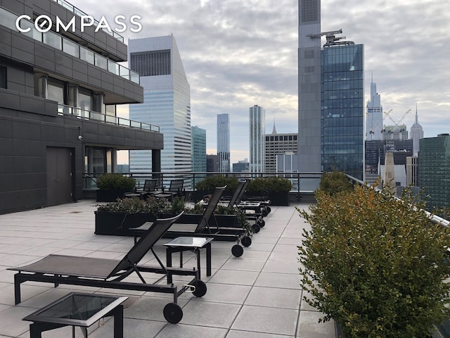 view of patio featuring a view of city