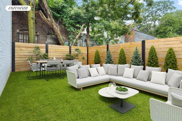 26 Goodwin Pl Unit 2R, New York City, NY 11221 - view of yard with an outdoor living space and outdoor dining space