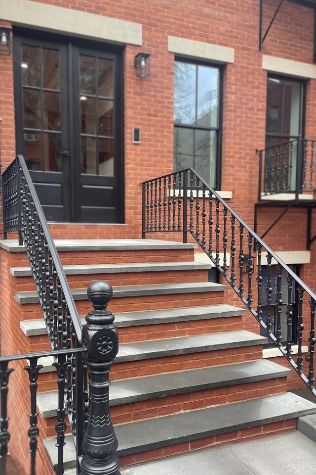 110 Luquer St Unit 3, New York City, NY 11231 - view of exterior entry with french doors and brick siding