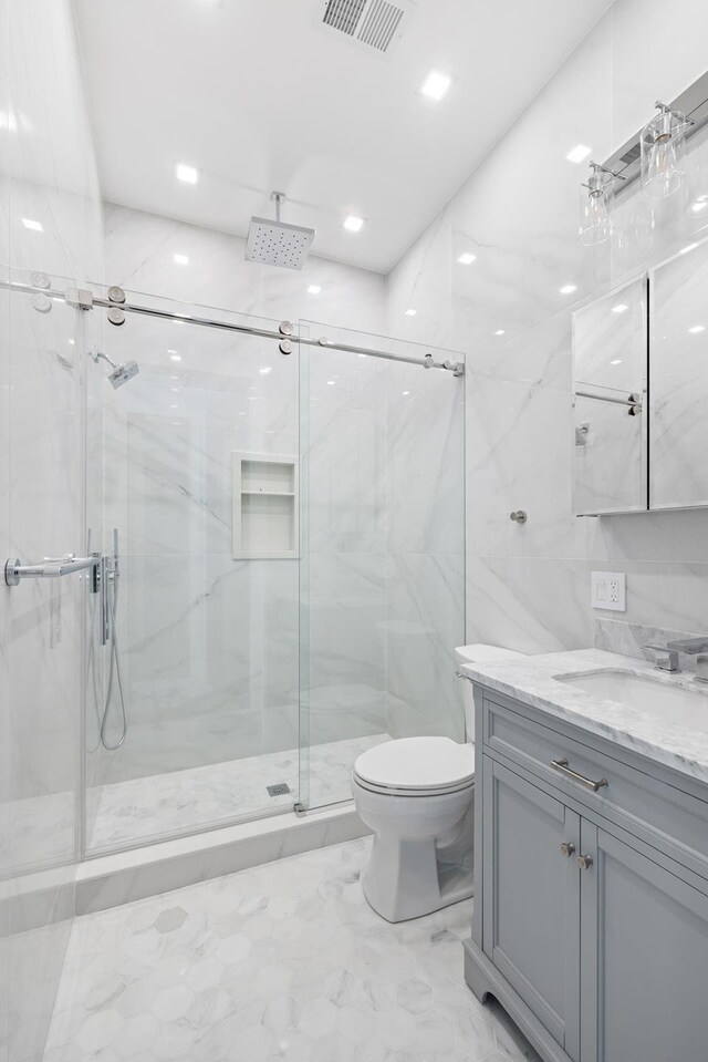 110 Luquer St Unit 3, New York City, NY 11231 - bathroom with a marble finish shower, vanity, toilet, and marble finish flooring