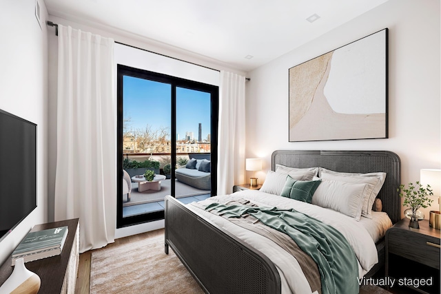 110 Luquer St Unit 3, New York City, NY 11231 - bedroom with access to outside and light wood-style floors