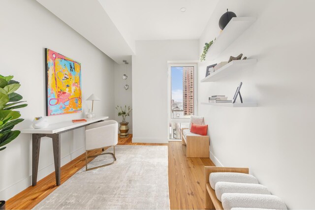 427 E 90th St Unit Ph10, New York City, NY 10128 - home office featuring wood finished floors and baseboards
