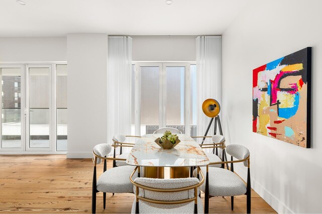 427 E 90th St Unit Ph10, New York City, NY 10128 - dining space with wood finished floors