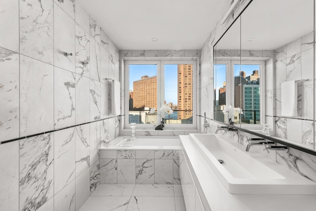 427 E 90th St Unit Ph10, New York City, NY 10128 - bathroom with tiled bath and vanity