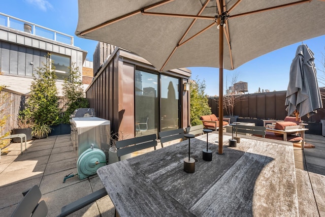 165 Hudson St Pha, Pha, New York City, NY 10013 - wooden deck with a patio area, an outdoor living space, a fenced backyard, and outdoor dining space