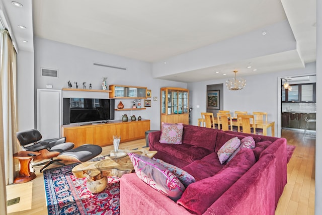 80 Riverside Blvd Unit 16-P, New York City, NY 10069 - living area featuring hardwood / wood-style flooring, a chandelier, and recessed lighting