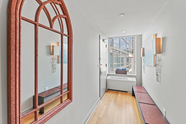 80 Riverside Blvd Unit 16-P, New York City, NY 10069 - hall featuring wood-type flooring and radiator