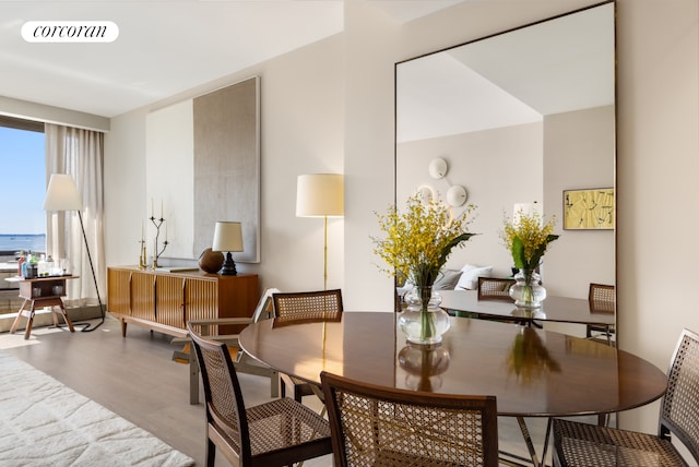 500 W 18th St Unit West9F, New York City, NY 10011 - dining room with wood finished floors