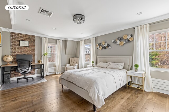 8119 Ridge Blvd, New York City, NY 11209 - bedroom with wood-type flooring, visible vents, crown molding, and recessed lighting