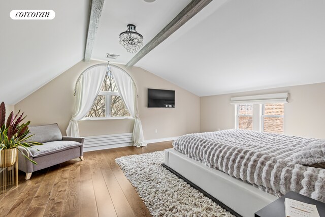 8119 Ridge Blvd, New York City, NY 11209 - bedroom featuring baseboards, visible vents, hardwood / wood-style flooring, and lofted ceiling with beams
