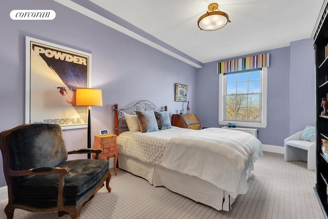 bedroom with baseboards and visible vents