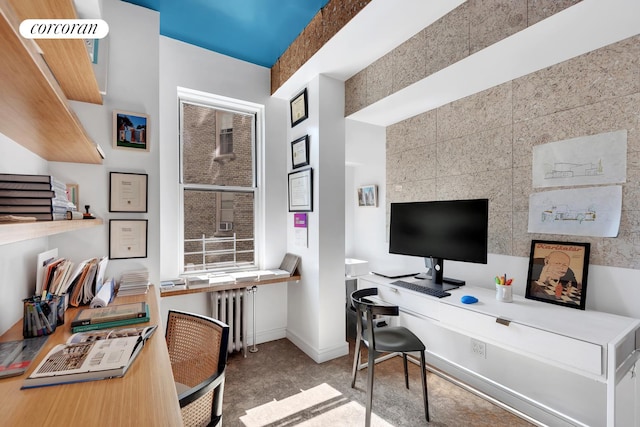 office featuring baseboards and radiator
