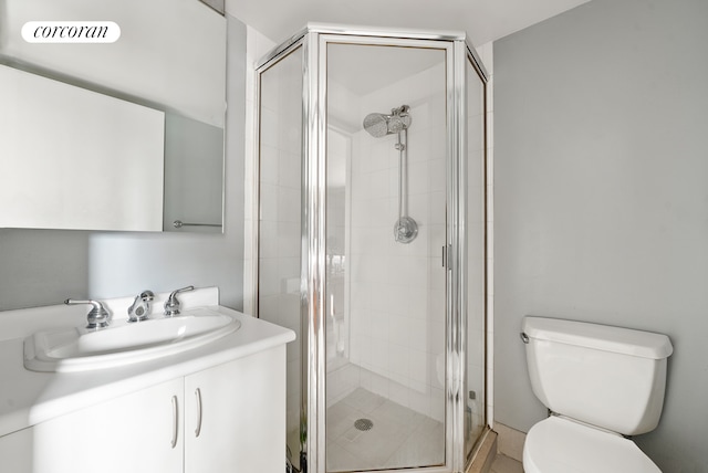 68 Bradhurst Ave Unit 6V, New York City, NY 10030 - bathroom featuring toilet, vanity, and a stall shower