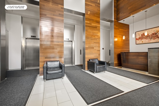 68 Bradhurst Ave Unit 6V, New York City, NY 10030 - building lobby featuring wood walls and a high ceiling