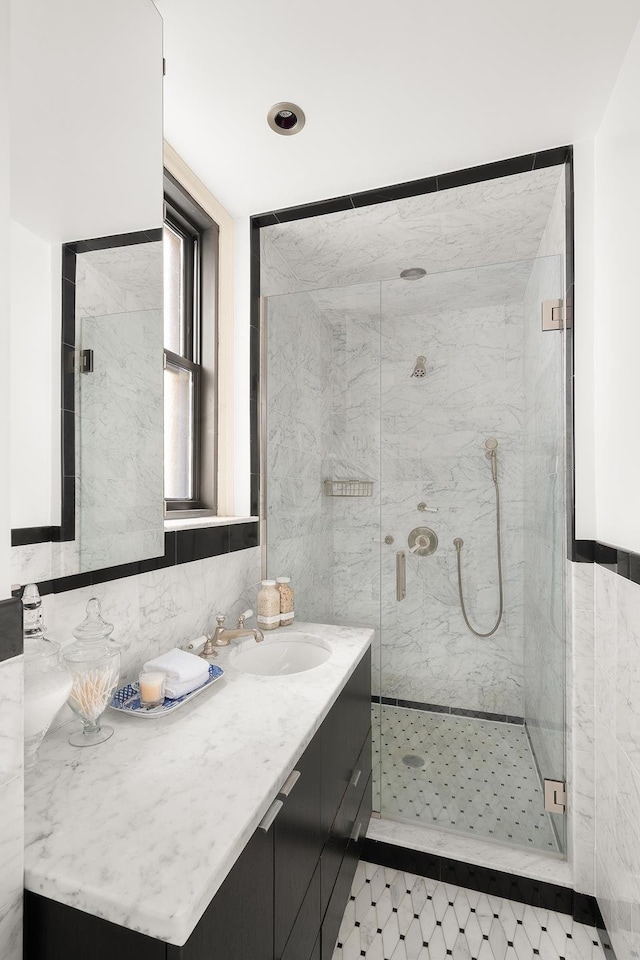 277 W End Ave Unit 9E, New York City, NY 10023 - bathroom featuring a marble finish shower and vanity
