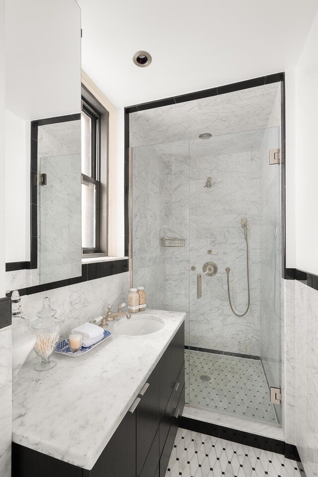277 W End Ave Unit 9E, New York City, NY 10023 - bathroom featuring a marble finish shower and vanity
