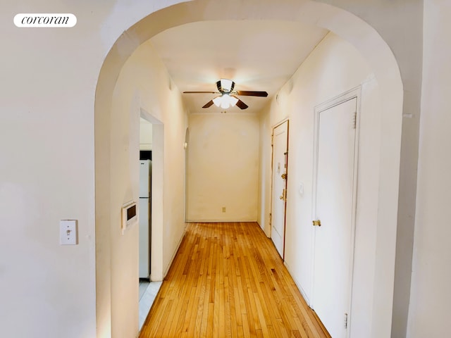 762 Brady Ave Unit 621, New York City, NY 10462 - corridor featuring arched walkways and light wood-type flooring