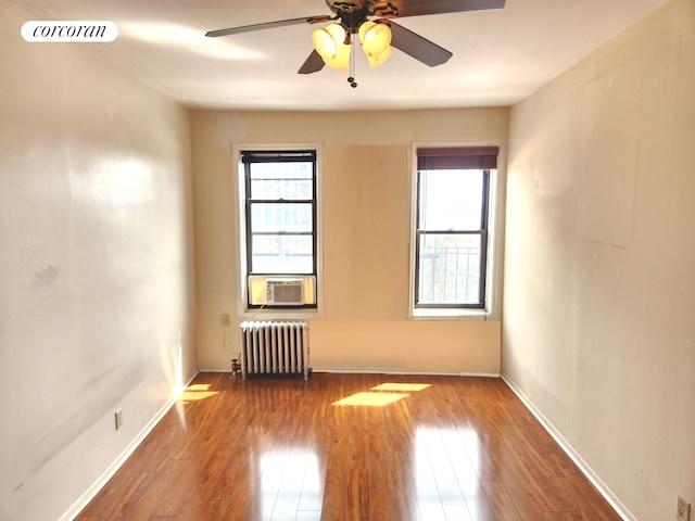 762 Brady Ave Unit 621, New York City, NY 10462 - unfurnished room with radiator heating unit, plenty of natural light, wood finished floors, and ceiling fan