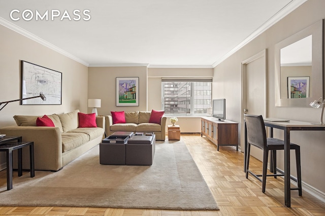 living room with baseboards and ornamental molding