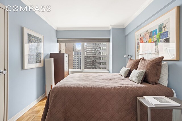 bedroom featuring baseboards and ornamental molding