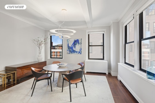 dining room featuring dark wood-style flooring, baseboards, ornamental molding, and beam ceiling