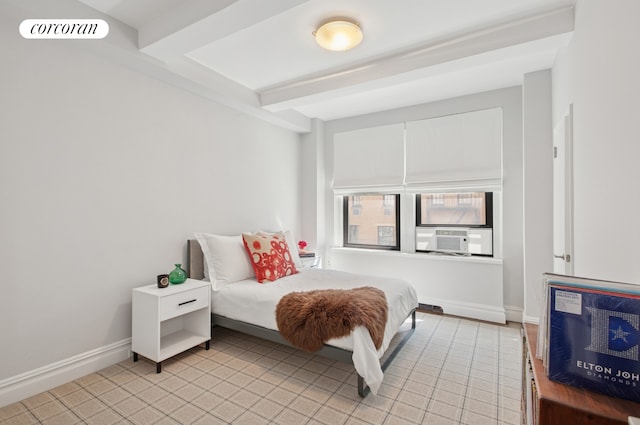 bedroom featuring baseboards, cooling unit, beam ceiling, and visible vents