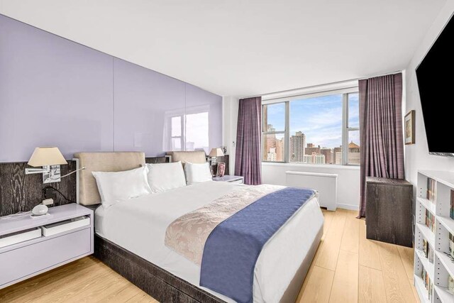 444 E 86th St Unit 21J, New York City, NY 10028 - full bath featuring visible vents, toilet, and vanity