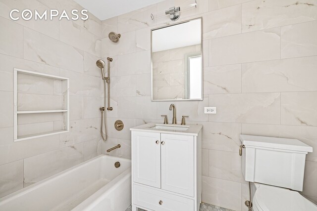 119 Henry St Unit 3, New York City, NY 11201 - bathroom with toilet, shower / washtub combination, vanity, and tile walls