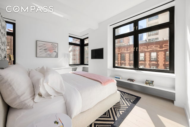 bedroom featuring wood finished floors