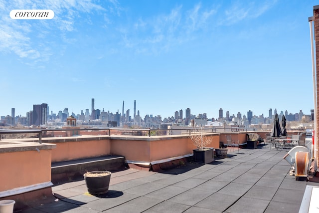 14-43 28th Ave Unit 4H, New York City, NY 11102 - view of patio / terrace featuring a view of skyline