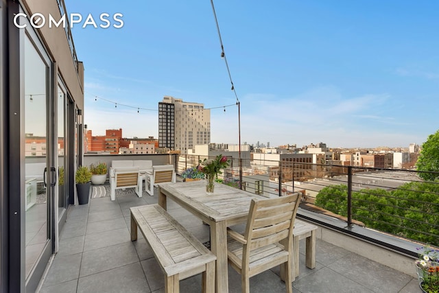 balcony featuring a view of city