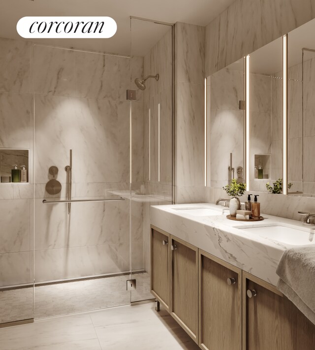 181 Macdougal Street Penthouse, New York City, NY 10011 - full bath with double vanity, tile walls, a sink, and a marble finish shower