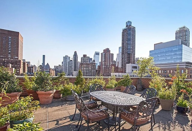 view of patio / terrace featuring a view of city
