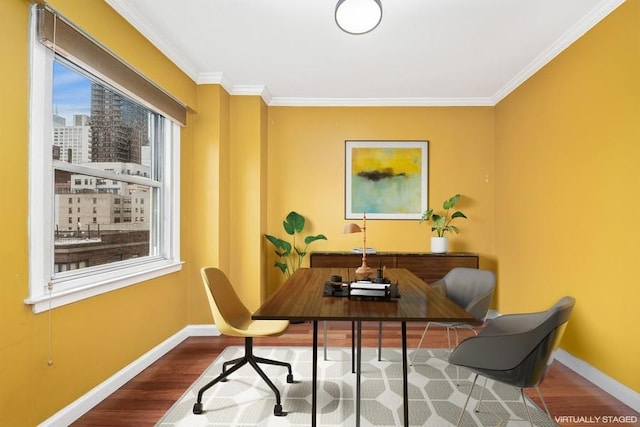 office area with baseboards, ornamental molding, and wood finished floors