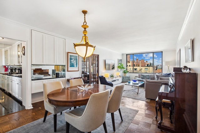 115 E 87th St Unit 18A, New York City, NY 10128 - dining area featuring ornamental molding
