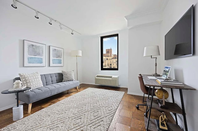 115 E 87th St Unit 18A, New York City, NY 10128 - office area with track lighting, a wall mounted air conditioner, crown molding, and baseboards