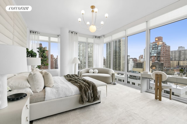 carpeted bedroom featuring a notable chandelier, a city view, and visible vents
