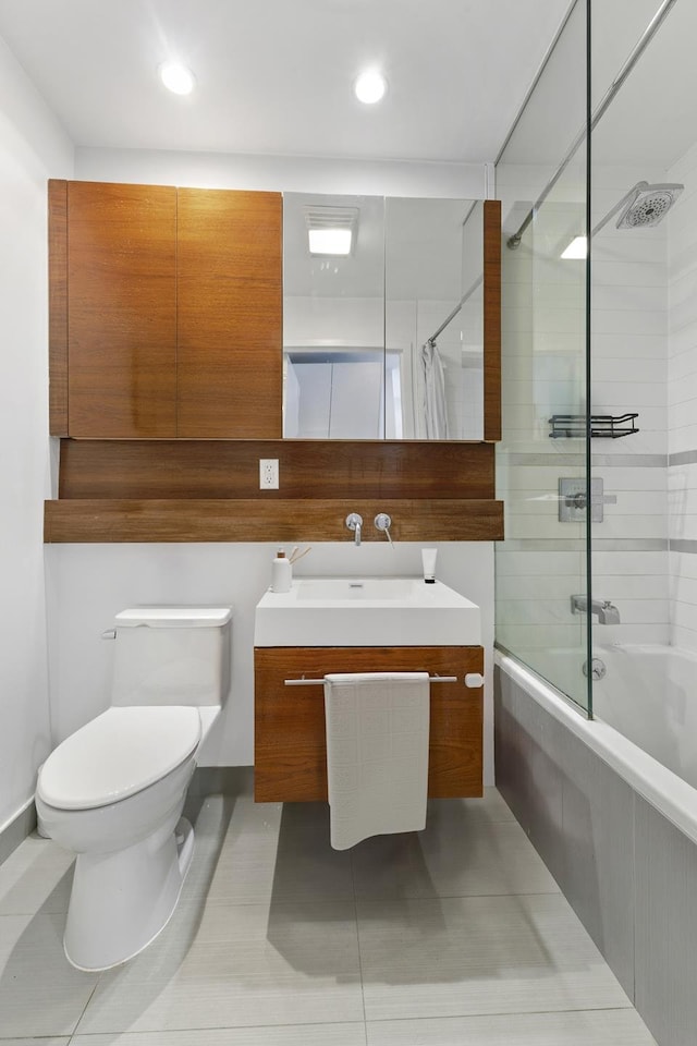 bathroom featuring bathing tub / shower combination, vanity, toilet, tile patterned floors, and recessed lighting