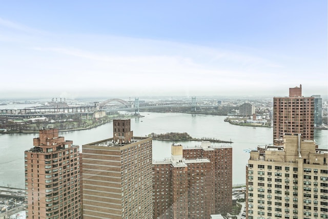 view of city with a notable bridge and a nearby body of water
