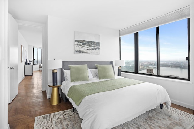 bedroom featuring baseboards
