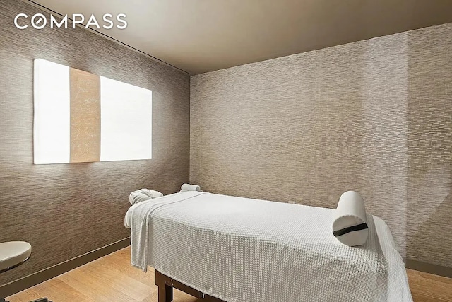 bedroom with light wood-style floors