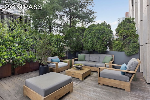 deck featuring outdoor lounge area
