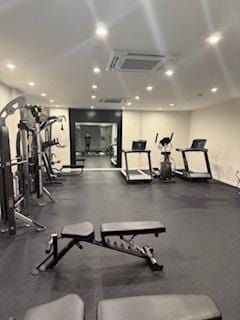 workout area featuring recessed lighting