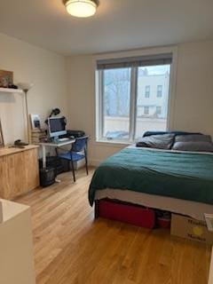 bedroom with light wood-style floors