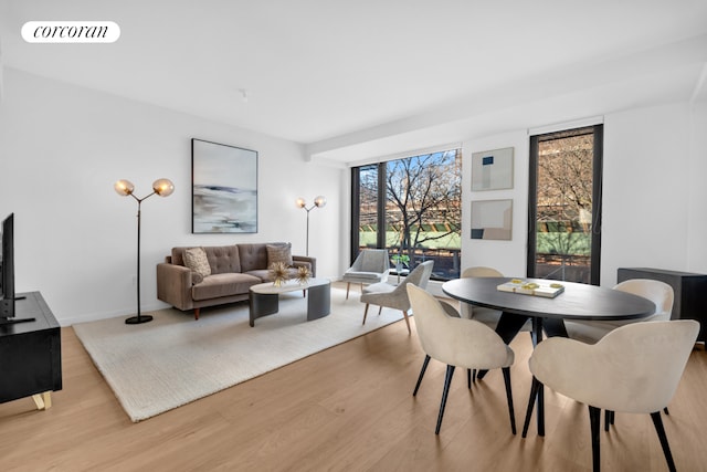 28 Huntington St, New York City, NY 11231 - dining area featuring light wood finished floors