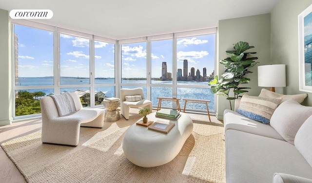 20 River Ter Unit 9M, New York City, NY 10282 - living room featuring visible vents, a water view, expansive windows, and a wealth of natural light