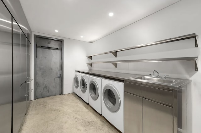 205 W 19th St Unit 11, New York City, NY 10011 - laundry room with washer and dryer and recessed lighting