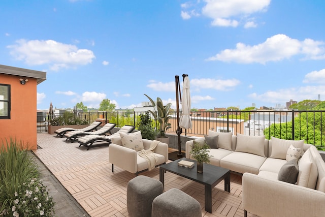 view of patio / terrace with outdoor lounge area and fence